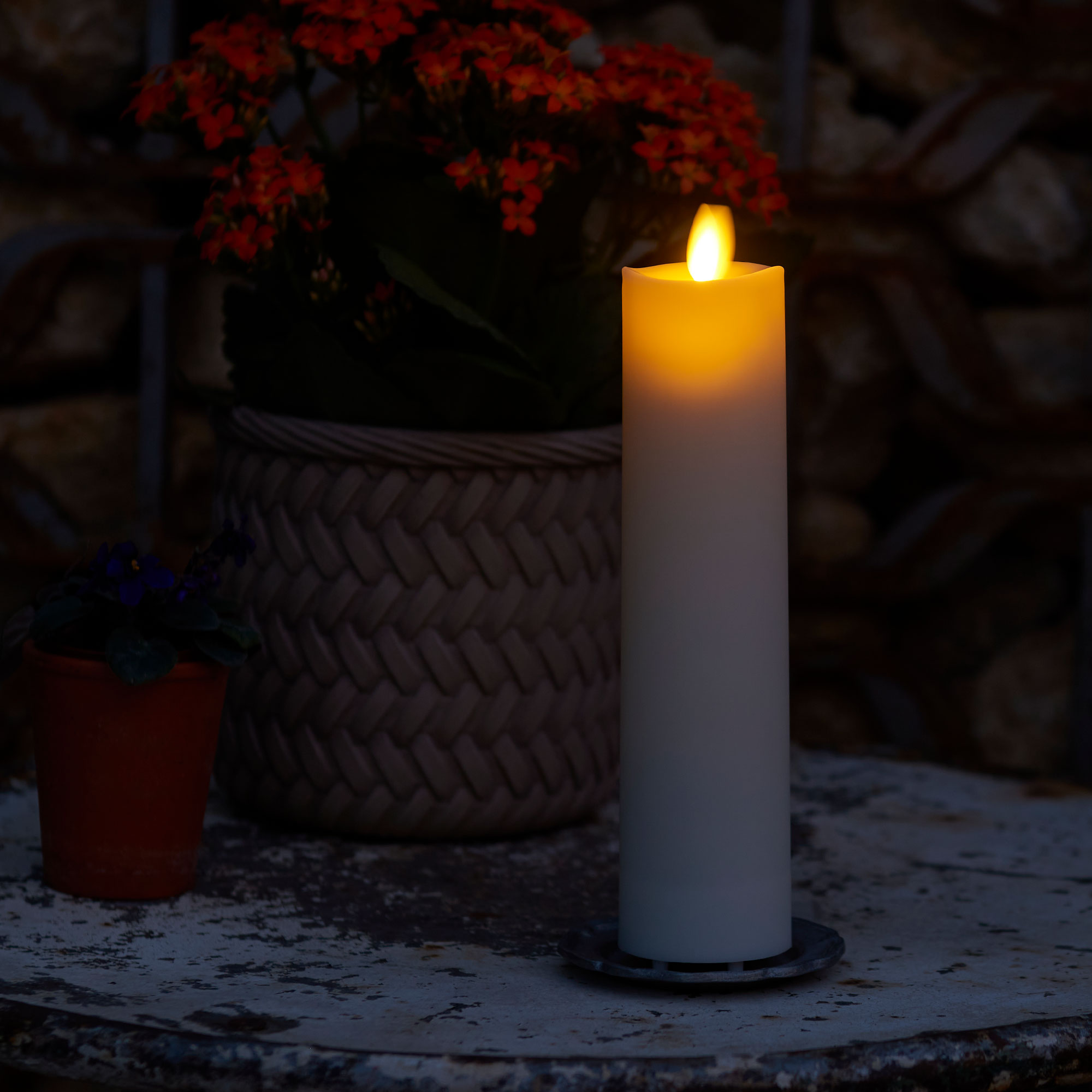 sm-image-1a3192ae0937c22f18b38fc0 Pearl Ivory Outdoor Flameless Candle Slim Pillar - Melted Top - 2" Width
