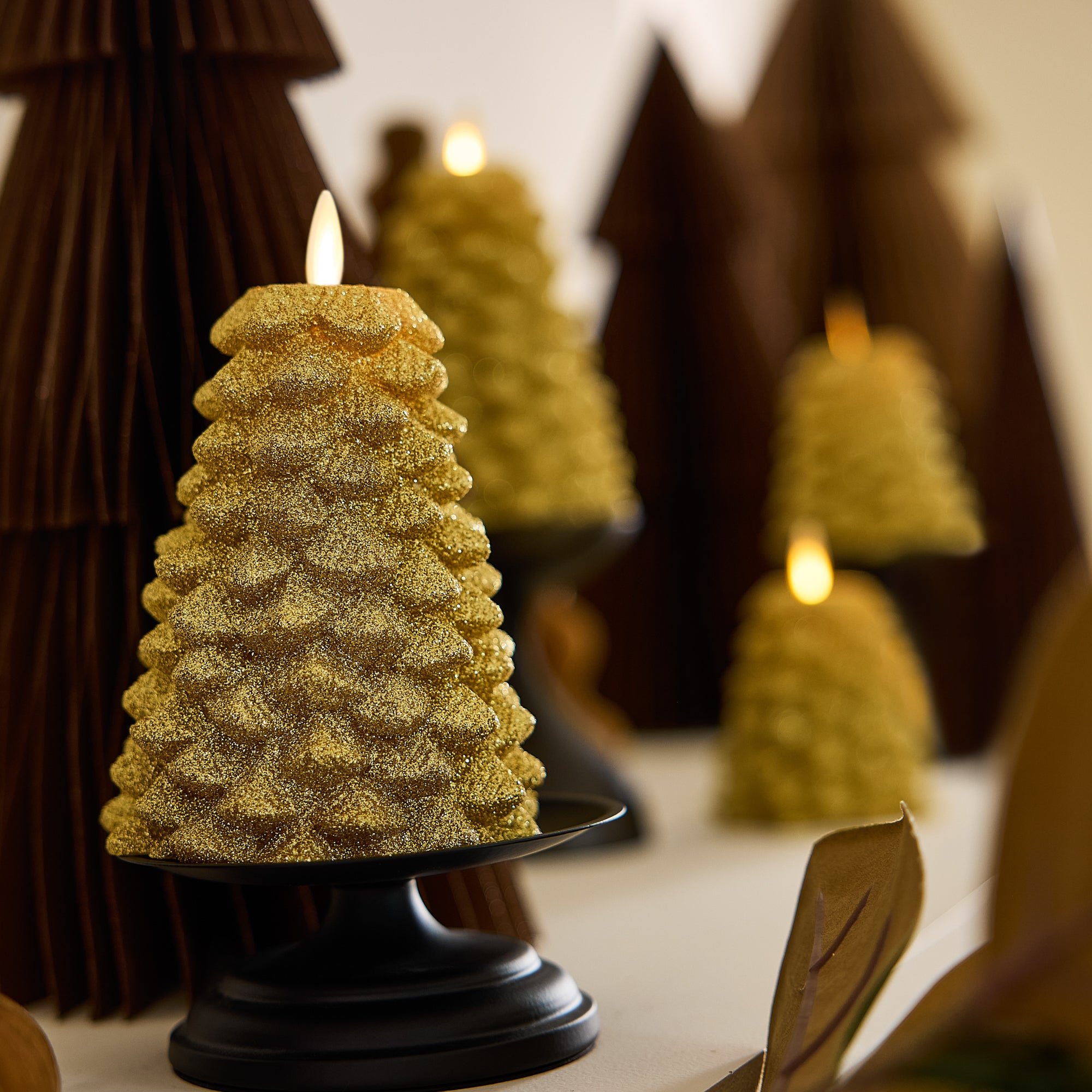 sm-image-28f8dbf45414fcf9aea0bbe1 Rich Gold Glitter Flameless Candle North Tree