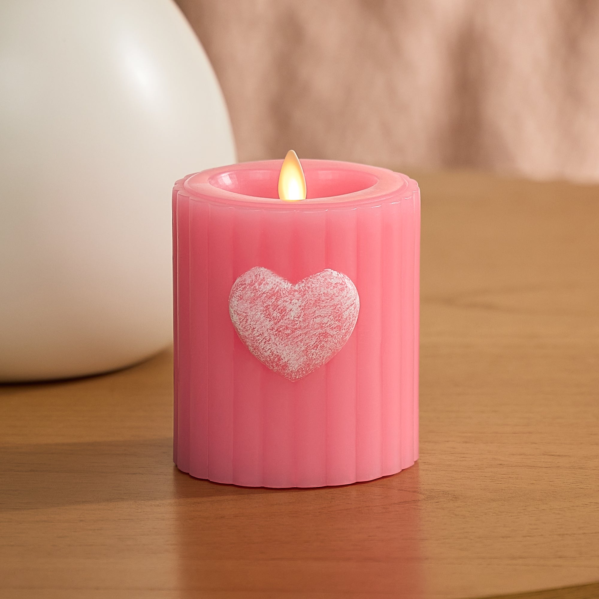 sm-image-34c6952937b80d799643cf9f Sweet Pink Ribbed Flameless Candle Pillar