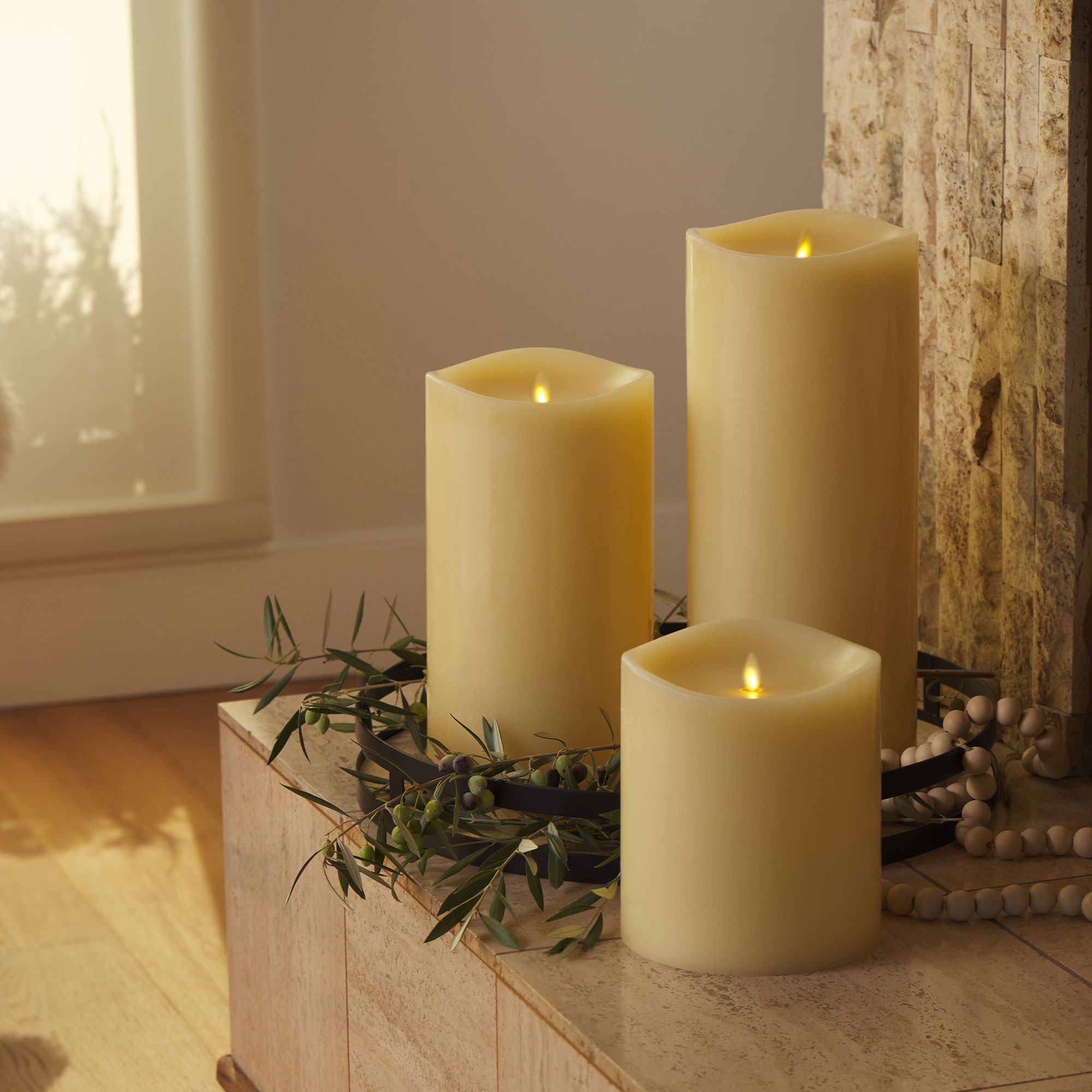 sm-image-824f7451d743bf70938cdaf5 Ivory Flameless Candle Grand Pillar - Melted Top - 6.25" Width