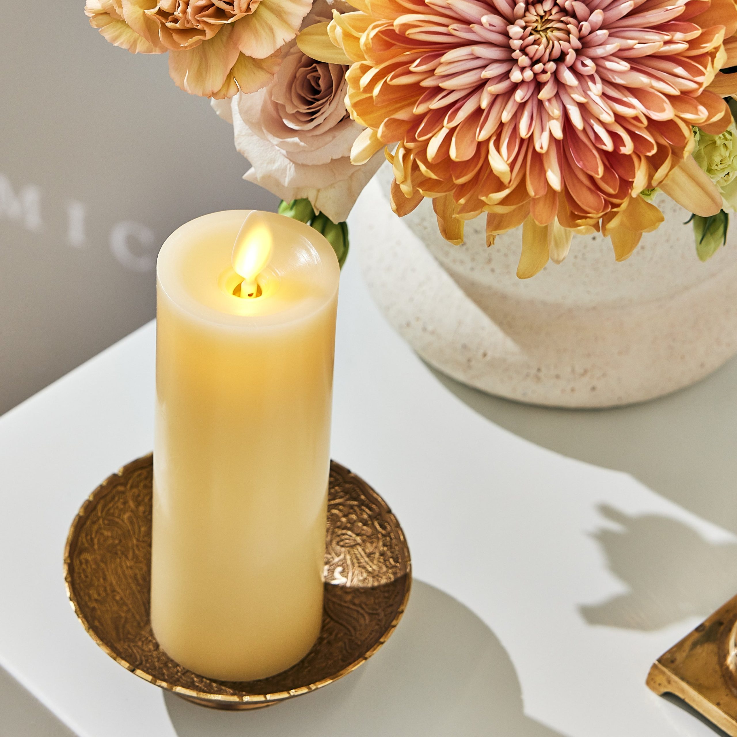 sm-image-8ddab2b45d30d6517e38fc4d Ivory Flameless Candle Slim Pillar - Recessed Top - 2" Width