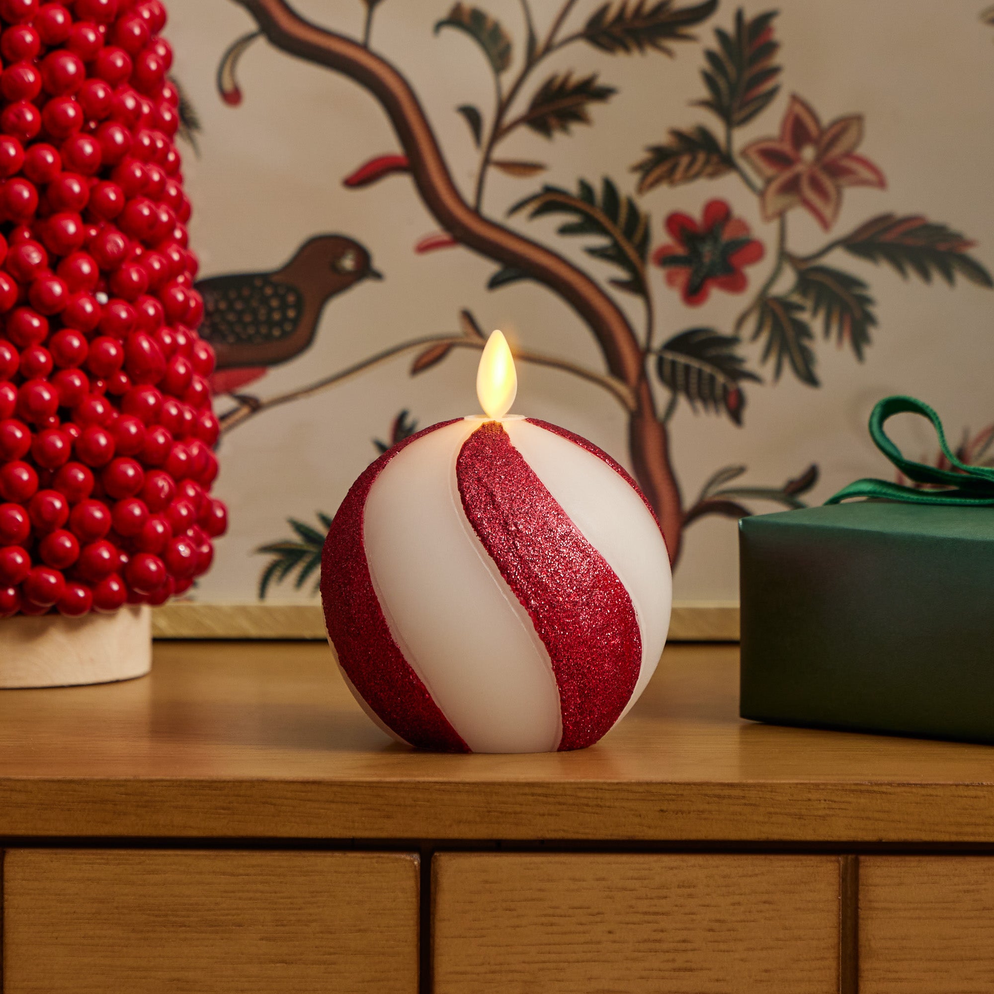 sm-image-cfabc7a7e42a6f60feb10d95 Red Candy Cane Glitter Stripe White Flameless Candle Sphere